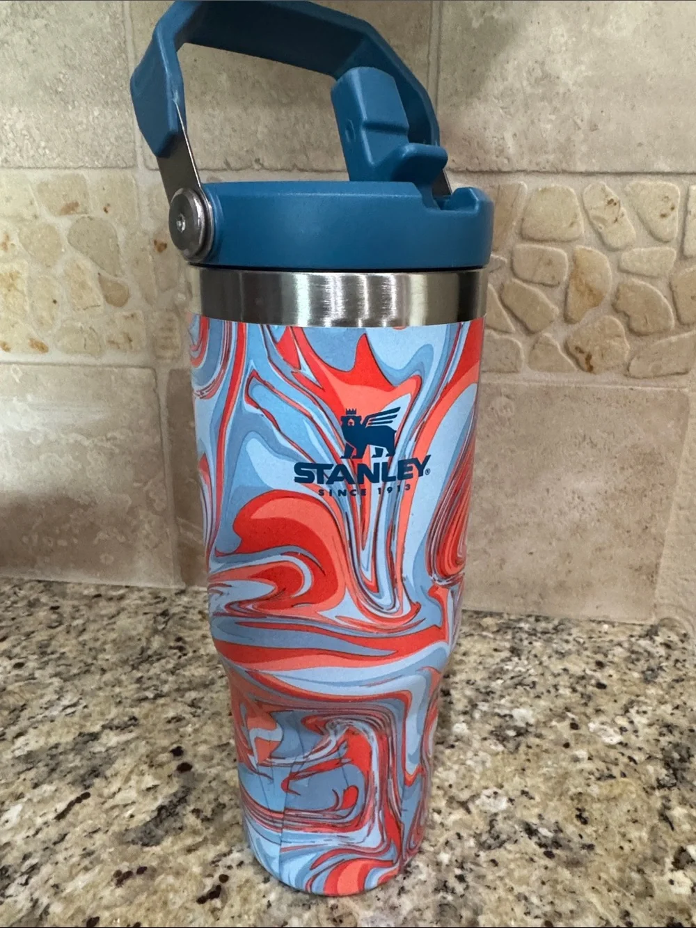 Stanley Blue and Red Swirl Travel Tumbler with Handle Lid